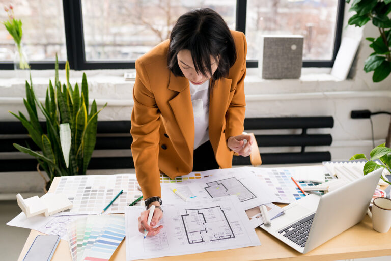 Woman,Architect,Working,On,Interior,Renovation,In,Workplace
